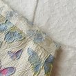 フロントウエストにはレースを重ねて 品をプラス。